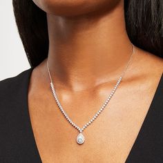 Exude an elegant vibe when you wear this pear-shaped lab-created diamond drop necklace. Fashioned in cool 10K white gold A double frame of lab-created diamonds surrounds the 1/2 ct. pear-shaped lab-created diamond drop. Round lab-created diamonds line half the length of the design in sparkle. Radiant with 2 cts. t.w. of lab-created diamonds This adjustable 18.0-inch cable chain necklace secures with a lobster claw clasp. Exquisite Pear-shaped Diamond Necklace For Formal Occasions, Exquisite Pear-shaped Diamond Necklace For Formal Events, Bridal White Gold Diamond Necklace In Pear Shape, Pear-shaped Diamond Bridal Necklace In White Gold, Elegant Pear-shaped Diamond White Necklace, Pear-shaped Brilliant Cut Diamond Bridal Necklace, Exquisite Drop Diamond Necklace For Formal Occasions, Exquisite Diamond Drop Necklace For Formal Occasions, Formal Pear-shaped Brilliant Cut Diamond Necklace