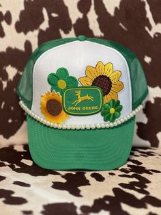 "John Deere" Trucker Hat., Otto Brand, this item can be customized with other patches and/or initials/numbers Hats With Patches, Curved Brim, One Size Fits Most, Flat Brim Hats With Logo Patch For Spring, Retro Adjustable Hat With Embroidered Patch, Spring Hats With Patches, One Size Fits Most, Vintage Cap With Letter Patch, Vintage Hat With Letter Patch, Green Snapback Hat With Embroidered Patch, Spring Cap With Patches, Vintage Adjustable Hat With Embroidered Patch