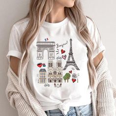 Hello, thanks for visiting Violeta's Shop! ♥ Paris Tshirt, Travel T-Shirt, Eiffel Tower TShirt, Women Paris Shirt, Paris Travel, Gift Paris, France **PLEASE review the sizing charts before ordering - measuring is always the best idea! --- Details --- UNISEX TSHIRT essential fits like a well-loved favorite. Super soft cotton and excellent quality print make one to fall in love with it over and over again. ♥ Retail fit ♥ 100% Soft cotton (fibre content may vary for different colors) ♥ Light fabric Disney Paris Shirt, Paris Shirt Ideas, Travel Tshirt Design Ideas, Belgium Trip, Paris Tshirt, Paris Tee, Travel Tshirt, Paris Shirt, Disney Paris