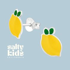 🍋 These sterling silver stud earrings are fun-tastic for kids of all ages. With an anti-tarnish coating, they'll stay as shiny as your personality. Say goodbye to boring accessories and hello to ear candy that'll make you the envy of the playground...or the boardroom! *  925 Sterling Silver *  Enamel *  6 mm x 9 mm *  Anti-Tarnish Finish *  Hypoallergenic *  Lead and Nickel Free These delicate stud earrings are handcrafted from 925 sterling silver that is tarnish resistant, hypoallergenic, nick Trendy Silver Earrings For Birthday, Playful Sterling Silver Hypoallergenic Jewelry, Playful Hypoallergenic Sterling Silver Jewelry, Fun Silver Earrings For Birthday, Novelty Hypoallergenic Sterling Silver Earrings, Playful Yellow Hypoallergenic Earrings, Novelty Sterling Silver Hypoallergenic Earrings, Hypoallergenic Novelty Sterling Silver Earrings, Playful Hypoallergenic Yellow Earrings