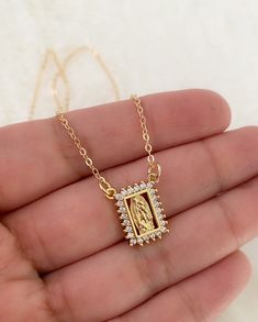 Our lady of Guadalupe necklace MATERIAL AND SIZE 18k gold plated medal 18k gold filled cable chain Cubic zirconia Size pendant: 1.4x1.2cm Length chain: you can choose it If you have questions about the product, feel free to reach me out. Don't forget to check out my other items in the store: Https://www.etsy.com/shop/nyahwithlove Spiritual Miraculous Medal Pendant Jewelry, Spiritual Our Lady Of Guadalupe Pendant Necklace, Spiritual Our Lady Of Guadalupe Jewelry Gift, Virgin Mary Pendant Jewelry Gift, Virgin Mary Pendant Jewelry As A Gift, Virgin Mary Pendant Necklace As Gift, Gold Virgin Mary Necklace Gift, Gold Plated Miraculous Medal Jewelry As Gift, Spiritual Virgin Mary Medallion Jewelry