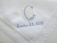 Gorgeous white Irish linen handkerchief personalized with classic Zundt style 1-initial monogram and your wedding date.What an exquisite lace handkerchief for the beautiful bride and/or for the Mother of the Bride and Mother of the Groom!Handkerchief Size~~Approx. 10"x10"Handkerchief Color~~White 1" Cotton LaceColor of Monogram shown in main photo (R) ~white initial on pastel blue scroll work, date in white thread Color of Monogram shown in second photo (C) ~ pastel blue initial on ivory scroll Classic Handkerchiefs With Lace Trim As Gift, Classic Personalized Wedding Handkerchiefs, Elegant Customizable Handkerchiefs For Personalized Gifts, Elegant White Handkerchiefs For Personalized Gift, Elegant Personalized Wedding Handkerchiefs, Elegant Customizable Wedding Handkerchiefs, Elegant Wedding Handkerchiefs Customizable, Elegant White Handkerchiefs For Wedding Gift, Elegant White Lace Handkerchiefs