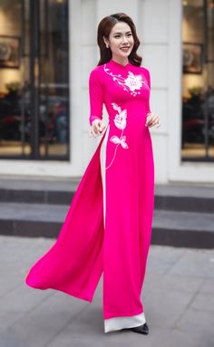 Very elegant design. Pink Stretch Maxi Dress For Formal Occasions, Full Length Pink Party Dress, Pink Fitted Floor-length Maxi Dress, Elegant Pink Stretch Maxi Dress, Spring Pink Maxi Dress For Formal Occasions, Pink Stretch Long Sleeve Maxi Dress, Pink Stretch Maxi Dress With Long Sleeves, Spring Evening Ao Dai With Long Sleeves, Long Pink Party Dress