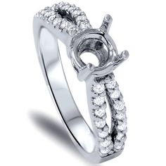 a white gold ring with diamonds on it