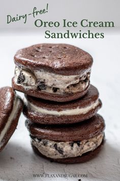 three ice cream sandwiches stacked on top of each other with the words dairy - free oreo ice cream sandwiches