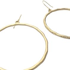 Rim Dangle Hoop Earrings - a perfect grab and go accessory. It features beautiful exaggerated open circle suspended from exaggerated ball dot French hook ear wire. Zinc alloy metal base Gold-plated, matted - durable and resistant to corrosion (tarnish resistant) Internal diameter of circle is 60 mm Weight: ~11 grams each (20.5 grams for both) - light-medium weight and can be easily worn all day Handcrafted artisan radiant beauty, so expect unique and minor variations from the product displayed. Metal Open Circle Hoop Earrings, Everyday Metal Hoop Earrings With Ear Wire, Modern Metal Open Circle Hoop Earrings, Metal Open Circle Earrings For Everyday, Metal Open Circle Earrings, Everyday Hammered Metal Hoop Earrings, Everyday Metal Open Circle Earrings, Adjustable Brass Hoop Earrings, Everyday Metal Circle Earrings