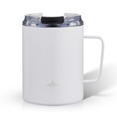 a white coffee mug with a black lid