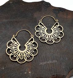 HANDMADE Beautiful Mandala hoop earrings. Ideal for everyday wear or for a special bohemian look. SIZE Aprox Length: 4.7cm Aprox diameter: 3.8 cm Handmade with high quality hypoallergenic Jewelery brass, nickel free. LINK Please follow the link to view my shop for other beautiful pieces. https://www.etsy.com/uk/shop/JagathaStudio Nickel-free Hoop Earrings For Festivals, Nickel-free Hoop Earrings For Festive Occasions, Festive Nickel-free Hoop Earrings, Festive Brass Hoop Earrings With Ear Wire, Bohemian Hoop Earrings For Festive Occasion, Bohemian Festive Hoop Earrings, Festive Bohemian Hoop Earrings, Festive Bohemian Small Hoop Jewelry, Summer Brass Hoop Earrings As Gift