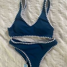 Blue And White Crochet Trim Bikini. New With Tags. Ordered And Tried On But Too Small For Me. Super Cute Though, Will Be Ordering In A Larger Size. Blue Lined Swimwear For Beach Season, Lined Blue Swimwear For Beach Season, Partially Lined Swimwear For Summer Beach, Summer Blue Tankini With Triangle Top, Partially Lined Swimwear For Beach Season, Blue Lined Tankini For Sunbathing, Lined Blue Tankini For Sunbathing, Blue Lined Summer Swimwear, Summer Blue Lined Swimwear