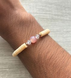 A pale yellow Heshi bead elastic bracelet with a marble pink glass bead and crystal clear glass beads. There are also metallic rose gold accents. This cute and simple piece is a great gift for anyone in your life or a great gift for yourself! It has pastel tones that make it calm but colorful! 💛🤍 If you'd like to order anything custom, contact me at: -210-773-2555 -Vanitx@yahoo.com -Message me from my shop (VCDesignsOnline) -Instagram: VCDesignsOfficial Marble Pink, Metallic Rose Gold, Rose Gold Accents, Elastic Bracelet, Pink Marble, San Antonio Tx, Pink Glass, Pale Yellow, Glass Bead