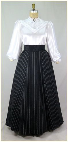 "Linen/Cotton. Color: Black and white. Medium weight yarn dyed pinstripe black and white stripe linen blend woven fabric with a graceful drape. Victorian style skirt cut in 3 gore style for the silhouette of the period. Comfortable matching black and white stripe elastic waistband. Total circumference approx. 94\"' at hemline. Wide variety of sizes and lengths. Dry clean. Circa 1890-1905. Made in U.S.A. Sizes: SM, MED, LG, XLG & 2XLG. Size Assistance for Elastic Waist Skirt: SM fits up to 26\" w Diy Victorian Dress, Elegant Striped Relaxed Skirt, Striped Pleated Fitted Skirt, Elegant Fitted Striped Skirt, Fitted Black Skirt With Vertical Stripes, Drow Fashion, Matilda Vibes, Victorian Era Outfits, Victorian Skirts