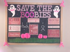 a bulletin board with pink ribbon around it and some decorations on the wall behind it