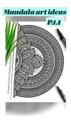 an intricately designed coloring book with green grass in the foreground and two pens next to it