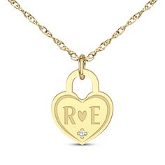 This engravable heart-shaped lock necklace is a stylish look of love. 10K yellow gold Features your and your loved one's initials inscribed with a heart in the middle A diamond accent shimmers at the bottom of the heart 16- to 18-inch adjustable rope chain with spring ring clasp Heart Lock Necklace, Look Of Love, Heart Lock, Lock Necklace, Accessories Jewelry Necklace, Rope Chain, Spring Rings, A Heart, Of Love