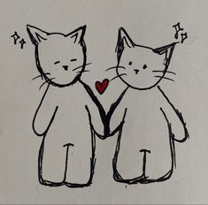 two cats holding hands with a heart in the middle