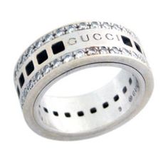 Gucci 18K White Gold and Diamond Ring containing 48brs. +/- .80ct.   Finger size 4 3/4. Item Number: 72266 Designer Diamond Ring With Pave Setting, Designer Diamond Ring With Vvs Clarity, Designer White Gold Ring With Pave Setting, Designer Brilliant Cut Rings, Designer Diamond Ring With Accents, Designer Ring With Pave Setting, Designer Rings With Diamond Accents For Formal Events, Aaa Quality Diamond Classic Rings, Classic Diamond Rings Aaa Quality