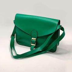 Cross Body Satchel Color: Green Size: One Size Condition: Nwt Product Details: This Stylish Faux Leather Cross-Body Bag Is An Intense Green With Gold Hardware Detail. It Has A Back Pocket, Perfect For Holding Your Smartphone. Satchel Style Cross-Body Strap Fold-Over Flap Top Buckle Detail Exterior Pocket Faux Leather Imported Casual Green Satchel For Office, Classic Green Bags For Spring, Classic Green Bag For Spring, Everyday Green Satchel With Hasp Closure, Cross Body Satchel, Leather Cross, Body Bag, Leather Crossbody Bag, Green And Gold