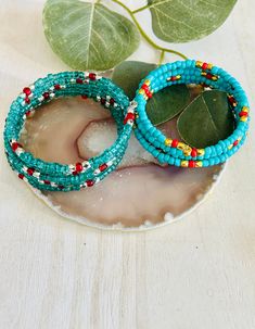 "The adorable turquoise and red memory wire bracelet. Made in the USA. This bracelet is the perfect accessory for any womens wardrobe.  This bracelet is a great womens gift.  Memory wire bracelet will fit any wrist and never loose its shape. Blue- 3/4\" wide Clear- 1\" wide" Turquoise Bangle Bracelet With Colorful Beads, Turquoise Colorful Beaded Bangle Bracelets, Turquoise Colorful Beads Bangle Bracelet, Turquoise Colorful Beaded Bangle Bracelet, Turquoise Beaded Bangle Friendship Bracelets, Turquoise Beaded Wrap Bangle Bracelet, Turquoise Beaded Bangle Bracelets, Turquoise Beaded Bangle Bracelet, Turquoise Stretch Bangle Bracelet For Gift