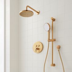 the shower head and handset are gold in color