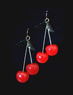 These earrings are a definite conversation starter.  A great addition to any look! Cherry Dangle Earrings For Party, Cherry Colored Earrings For Summer Party, Cherry Color Dangle Earrings For Party, Party Cherry Earrings, Cherry Color Earrings For Summer Party, Cherry Party Jewelry For Pierced Ears, Green Leaf, Leaf Earrings, Ear Wire