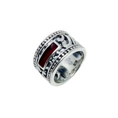 Striking men’s ring with a tribal design in Sterling silver 925 and red ruby ceramic Colorit enamel. The tribal chunky style of the ring is popular among men who want to make a statement with their accessories, and the addition of the red ruby ceramic Colorit enamel gives the ring a unique and eye-catching look. This ring is one of a Kind. Size R Width 14. 3mm Dish soap: For routine care, a quick wash in soapy water can be a sufficient way to keep silver shiny. Italian Jewelry Designers, S Ring, Chunky Ring, August Birthstone Jewelry, July Birthstone Jewelry, Italian Jewelry, Water Can, Chunky Rings, Jewelry Ring Box