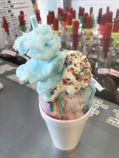 an ice cream sundae with sprinkles on top