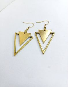 Two Triangles geometric earrings / Earth Symbol earrings / non binary minimal earrings / Tribal boho earrings by Katangelshop on Etsy Trendy Gold Triangle Earrings, Gold Triangle Minimalist Earrings, Minimalist Gold Triangle Earrings, Gold Geometric Earrings For Everyday, Geometric Brass Earrings For Gift, Everyday Gold Triangle Earrings, Geometric Metal Earrings For Everyday, Minimalist Brass Earrings For Everyday, Minimalist Brass Earrings As Gift