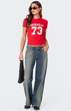 Online only! Show off your country chic style with the Nashville T-Shirt from Edikted, featuring a bold graphic print and text. This cute and casual piece is perfect for adding a touch of Southern charm to your everyday look!


	T-shirt
	Graphic print and text
	Cotton, Spandex
	Model wears size S
	Model height is 5'9
	Item care: Machine wash at maximum 30C, do not bleach, tumble dry low, iron at a maximum of 110C, do not dry clean. Red Hip Hop Cotton Tops, Red Cotton Hip Hop Tops, Urban Style Red Tops With Text Print, Red Urban Style Tops With Text Print, Red Urban Tops With Text Print, Casual Red Slogan T-shirt, Slim Fit Cargo Pants, Dad Jeans, Curve Jeans