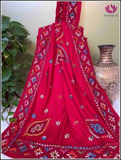 Red Embroidered Border Chanderi Saree, Red Chanderi Saree With Embroidered Border, Red Traditional Wear With Floral Embroidery For Ceremonies, Folk Style Red Shawl For Festival, Red Folk Shawl For Festivals, Bohemian Scarf With Embroidered Border, Red Unstitched Saree With Embroidered Border, Red Zari Work Saree For Festival, Red Saree With Embroidered Border