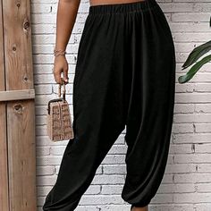 Black Plus Sz Drop Crotch Pants 95% Polyester 5% Elastane Black Non-stretch Wide Leg Sweatpants, Chic Black Harem Pants For Loungewear, Chic Black High-waisted Harem Pants, Non-stretch Black Wide-leg Pants, Chic Black Stretch Harem Pants, Chic Black Harem Pants With Pockets, Casual Black Harem Pants With Elastic Waistband, Chic Black Harem Pants With Relaxed Fit, Black Harem Pants With Elastic Waistband For Spring