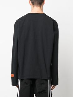 Find HERON PRESTON Graphic-print Long-sleeve Sweatshirt on Editorialist. black cotton round neck long sleeves graphic print to the front logo patch at the sleeve Cotton T-shirt With Ribbed Cuffs For Streetwear, Cotton Long Sleeve Streetwear Tops, Long Sleeve Cotton Tops For Streetwear, Cotton Long Sleeve Tops For Streetwear, Urban Long Sleeve Tops With Logo Print, Urban Long Sleeve Cotton Tops, Black Long Sleeve T-shirt With Ribbed Cuffs, Urban Style Long Sleeve Letter Print Tops, Urban Style Long Sleeve Tops With Letter Print