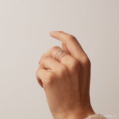 Our Skinny Stacking Rings are the simple and minimalist essentials for creating a dainty, multilayered finger stack that'll be the envy everyone around you. Their slightly textured finish adds a unique touch to the stack, as the trio features a ball, twist, and smooth band. Material: High-Quality Solid 925 Sterling Silver Finish: Sterling Silver ∙ 18K Gold Dimensions: 1mm This listing is for a set of 3 rings: 1 SOLID ring, 1 TWISTED ring, and 1 BEADED ring SKU: RR-RR051 Sizing Guide Rings are cr Adjustable Stackable Midi Rings Fine Jewelry, Everyday Dainty Stackable Rings, Delicate Stackable Adjustable Midi Rings, Dainty Stackable Midi Rings For Everyday, Minimalist Double Band Stackable Jewelry, Delicate Adjustable Stackable Midi Rings, Stackable Adjustable Delicate Midi Rings, Adjustable Stackable Delicate Midi Rings, Delicate Stackable Midi Rings For Everyday