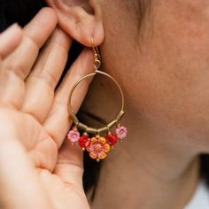 These bright cheery glass flower beads are our newest obsession. These beautiful beads are all made in the Czech Republic which is one of the largest glass bead producers in the world. These jewelry designs are guaranteed to bring a smile to your face as soon as you put them on! Flower beads are approximately 1/4" and 9/16" diameter. Ear wires are or gold plated. Overall length is approximately 2.5". Our images are the best representation of our designs and there may be some variation in your sh Curated Gift Boxes, The Czech Republic, Flower Beads, Curated Gifts, Gold Hoops, Gold Plated Silver, Silver Hoop Earrings, Beaded Flowers, Jewelry Designs