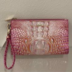 Brahmin Daisy Wristlet Peony Ombre Melbourne Leather Nwt (New With Tag, Dust Bag) Style: Q45 99 00097 Color: Peony Ombre Details: The Daisy Wristlet Is A Trim Rectangular Style That You Can Wear As A Wristlet Or Tuck Into A Larger Bag. An Interior Zip Pocket Holds Your Change And Allows You To Keep Every Last Inch Organized. 8.5″ W 5.38″ H 2.0″ D Zip Top Removable Wristlet Strap Interior Zip Pocket 5.5" Wristlet Drop Feminine Pink Wallets For Daily Use, Pink Rectangular Feminine Wallet, Pink Feminine Rectangular Wallet, Pink Pouch Clutch With Wrist Strap, Pink Clutch Wallet With Wrist Strap, Luxury Pink Pouch Clutch, Pink Clutch With Wrist Strap, Pink Feminine Clutch, Pink Rectangular Clutch With Removable Pouch