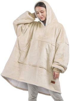 PRICES MAY VARY. WHY WEAR A BLANKET? EVERYONE lounges around their own home in the same comfy clothing, whether it's pajamas or comfy oversized blankets. Now you can conveniently wear a soft sherpa big hoodie every day in your home or even outside. FLUFFY SHERPA INTERIOR, SILK-FLEECE EXTERIOR: DONT YOU HATE IT WHEN your cold and your hoodie or blanket rides up on your belly, arms and ankles?! Never worry about cold air sneaking in with our wearable blanket, the arms have elastic cuffs to stay in Big Hoodie, Big Hoodies, Comfort Hoodie, Blanket Jacket, Bear Blanket, Comfy Clothing, Sweatshirt Blanket, Comfy Blankets, Oversized Blanket