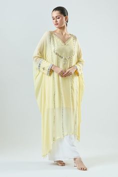 Yellow kaftan with mirror embroidery. Paired with pant and matching inner. - Aza Fashions Anarkali Gota Work Kaftan For Wedding, Bollywood Style Wedding Kaftan With Gota Work, Unstitched Kaftan With Mirror Work For Wedding, Bollywood Style Gota Work Kaftan For Eid, Wedding Kaftan With Dabka For Navratri, Traditional Georgette Abaya With Dabka Work, Festive Anarkali Kaftan With Mirror Work, Saree-shaped Kaftan With Mirror Work For Wedding, Wedding Kaftan With Mirror Work