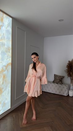 This short peach kimono robe is an elegant and versatile piece of clothing that combines style and comfort. Made from luxurious silk, this robe embodies the essence of traditional Japanese kimono clothing while offering a modern touch. Its short length makes it perfect for warm summer days. Ideal as a maternity dress, this wrap dress provides both comfort and flexibility. It's a thoughtful gift for a wife or girlfriend, and also makes a beautiful maid of honor gift or a special present for a dau Short Maternity Dress, Robes For Women, Traditional Japanese Kimono, Silk Kimono Robe, Summer Kimono, Bridal Robe, Maid Of Honour Gifts, Sophisticated Dress, Silk Robe