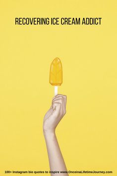 a hand holding an ice cream on a yellow background with the words recovering ice cream adict