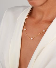 The magic of pearls intertwined with gold plated chain to create a heavenly appearance. This is exactly what you get in Pink Yumi Freshwater Pearl necklace that we have for you. Beautiful to wear on every occasion, this shining piece of jewelry is one of the best accessories you will ever expect to have. If you have been looking for a charmer necklace that comes as a breath of fresh air, then this is exactly what you need. Materials: 14k gold plated brass, freshwater pearl Measurements: 16.5"/41 Pearl White Pearl Clavicle Chain Necklace, Luxury Pearl Long Necklace With Chain, Luxury Pearl Long Necklace Jewelry With Chain, Luxury Long Pearl Necklace With Chain, Pearl Chain Long Necklace, Pearl White Pearl Necklace With Chain, Elegant Pearl Chain Necklace As Gift, Elegant Pearl Chain Necklace For Gift, Pearl White Pearl Jewelry With Chain