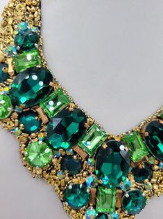 Green Crystal Necklace With Jewels, Unique Green Jeweled Jewelry, Green Crystal Beaded Necklaces As Gift, Green Crystal Beaded Necklace For Gift, Green Jeweled Choker Necklace, Handmade Green Crystal Necklaces, Green Rhinestone Jeweled Necklace For Gift, Green Crystal Necklace With Stones, Green Rhinestone Costume Jewelry Necklace As Gift