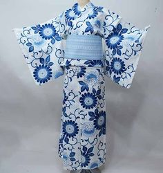 Yukata; This Japanese cotton kimono yukata features wave on a white background. Wear this beautiful robe on summer day or hang it as a display to admire daily. Item: Yukata Cotton Kimono / Obi belt is not included. No.ktm165 Size: US  M-L   /  Length  64 inch (163cm) , Width 26.7 inch (68cm). If you are 155cm - 167cm tall, This yukata would fit well, Condition: NEW. Please check the photos. Need a Obi Sash? Find it here: https://www.etsy.com/shop/KimonoFujiyamarock?ref=seller-platform-mcnav&sect White Cotton Kimono With Floral Print, Traditional White Kimono For Summer, Traditional White Summer Kimono, Traditional White Kimono For The Beach, Traditional White Floral Print Kimono, Traditional White Floral Kimono, White Kimono For Spring Tea Ceremony, White Kimono For Tea Ceremony In Spring, Hakama Women