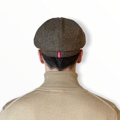 Hand-made hat in brown Donegal-style lambswool, Albert’s Brandy is a modern take on the Bakerboy flat cap featuring a distinctive headband round the back and a stud button in the peak.100% Merino lambswoolMaster Hatter to Savile Row, St James's and the Peaky Blinders, Mister Miller is now flying solo.With a career spanning 3 decades, hand-making the best of Britain's hats with the finest materials for him, her, them. There are bespoke and monogramming services to boot, and something to crown eve Fitted Six-panel Winter Hat, Fitted Winter Six-panel Hats, Classic Wool Beret With Short Brim, Classic Wool Brimmed Beret, Classic Brimmed Wool Beret, Classic Wool Flat Cap Beret, Classic Winter Six-panel Beret, Classic Six-panel Winter Beret, Fitted Wool Cap