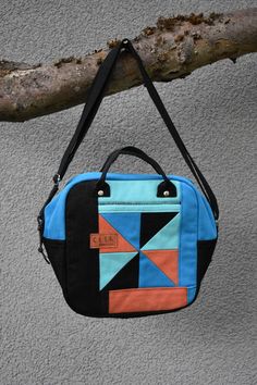 Unique, sustainable and rich in color! Is this the bag you are looking for? This beautiful handbag is upcycled from old denim jeans in bright colors using a patchwork technique to create a unique and quirky looking geometric pattern. The patchwork method and upcycling process requires patience and slow, neat handwork, which is reflected in this original colorful rectangular shape bag design. The non-woven fabric perfectly maintains this square shape of the bag even when the bag itself is empty. Super lightweight and has plenty of room for all the essentials you want to take with you. It can be carried as a handbag or over the shoulder as it has top handles and an adjustable strap. This bag is truly unique, exclusive and stylish. Perfect for any occasion! The same bag cannot be made twice. Patchwork Handbag, Upcycled Fabric, Denim Shoulder Bags, Beautiful Handbags, Find Color, Upcycled Denim, Bag Design, Etsy Fashion, Square Shape