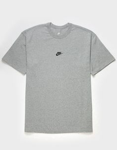 Nike Sportswear Premium Essentials Tee. The Nike Sportswear Premium Essentials T-Shirt Has A Loose Fit For A Carefree, Comfortable Look. Its Heavyweight Organic Cotton Fabric Feels Thick And Soft. This Product Is Made With At Least 75% Organic Cotton Fibers. Loose-Fitting Design Features Dropped Shoulders And Room Through The Chest And Shoulders For A Relaxed Look And Feel. Heavyweight Cotton Jersey Has A Stiff Drape And Dry Hand For A Crisp, Thick Feel. Embroidered Logo Front And Center Makes A Subtle Statement. 100% Cotton. Machine Wash. Imported. Gray Moisture-wicking Athleisure T-shirt, Nike Athletic Fit Sports T-shirt, Nike Athleisure Workout T-shirt, Athletic Heather T-shirt With Logo For Sports Season, Crew Neck T-shirt For Light Sports, Gray Athleisure T-shirt With Letter Print, Basic Breathable T-shirt For Sports, Athletic Heather Workout Tops With Short Sleeves, Athletic Heather Short Sleeve Athleisure Top