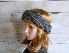 This is a fun winter ear warmer that will keep you warm and give a flattering shape to your face. The wide single cable gives it a boho, woodland crown look. Hand knit in either deep gray, marled grey and ivory, rose pink, sage green or winter white. Knit in one circular piece, it measures 22 inches in circumference without stretching and stretches to fit most adult women. 100% acrylic in all colors except the marled grey which is 100% wool. Hand wash and lay flat to dry. If you are interested i Casual Adjustable Hand Knitted Headband, Adjustable Hand Knitted Winter Headband, Winter Adjustable Hand-knitted Headband, Hand Knitted Adjustable Winter Headband, Hand Knitted Adjustable Headband For Winter, Adjustable Casual Headband For Winter, Adjustable Knitted Headband For Winter, Casual Yarn Headband For Winter, Casual Winter Yarn Headband