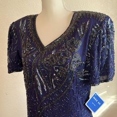 Subtle Yet Fancy Sequined Midi Length Dress. 100% Silk Exterior With Polyester Lining. All Tags Still On. Ideal For Evening Gala Or Wedding. Perfect Condition With All Beading/Sequin Intact. Blue V-neck Dress For Summer Formal Events, Blue V-neck Formal Dress For Summer, Blue Fitted V-neck Dress For Wedding, Blue V-neck Short Sleeve Dress For Party, Vintage V-neck Mini Dress For Formal Occasions, Blue Short Sleeve V-neck Dress For Party, Elegant Fitted Purple V-neck Dress, Blue Short Sleeve V-neck Formal Dress, Elegant Blue V-neck Dress With Short Sleeves