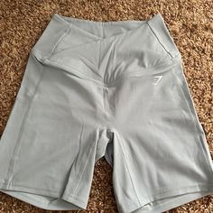 Never Worn Crossover Waist Band 4” Inseam Baby Blue Color Perfect Condition Super Stretchy Gymshark Shorts, Baby Blue Color, Cell Phone Holster, Baby Blue Colour, Phone Holster, Walker Boots, Pajama Shirt, Fit N Flare Dress, Bike Shorts