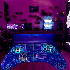 an illuminated video game controller in a living room