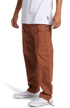 Cargo pockets amp up the versatility of these comfy everyday-staple pants crafted from durable organic cotton with a touch of stretch. Elastic waist Cargo flap-patch pockets 98% organic cotton, 2% elastane Machine wash, tumble dry Imported Baggy Cotton Parachute Pants With Functional Pockets, Cotton Parachute Pants With Hip Pockets, Brown Cotton Pants With Multiple Pockets, Casual Full-length Cargo Pants With Functional Pockets, Relaxed Fit Full Length Cargo Pants For Everyday, Everyday Solid Pants With Pockets, Everyday Solid Color Pants With Pockets, Everyday Solid Bottoms With Side Pockets, Everyday Relaxed Fit Full Length Cargo Pants