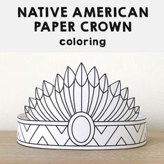 the native american paper crown is shown on a table with text overlay that reads, native american paper crown coloring